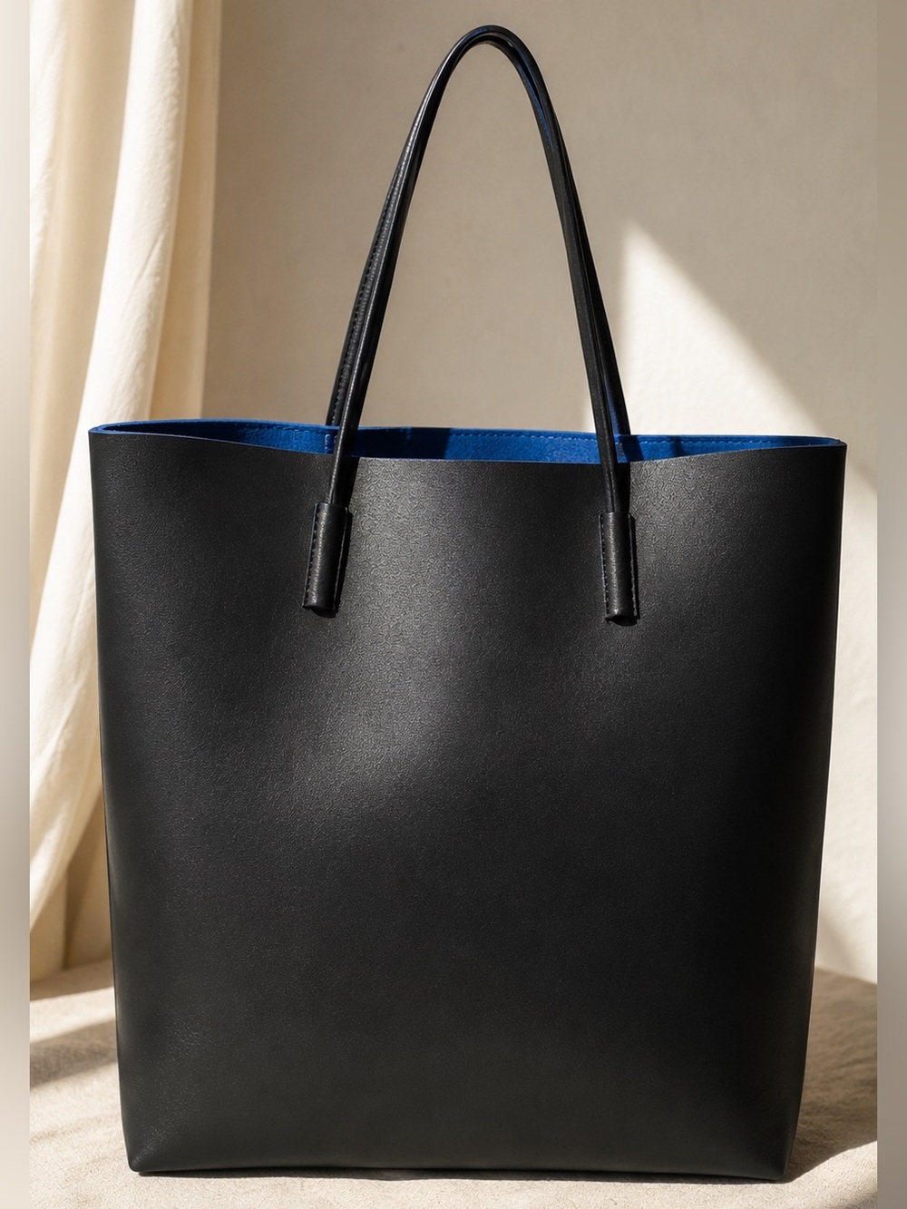 Minimalist Black Leather-Look Tote Bag with Cobalt Blue Interior - Picture 3 of 8
